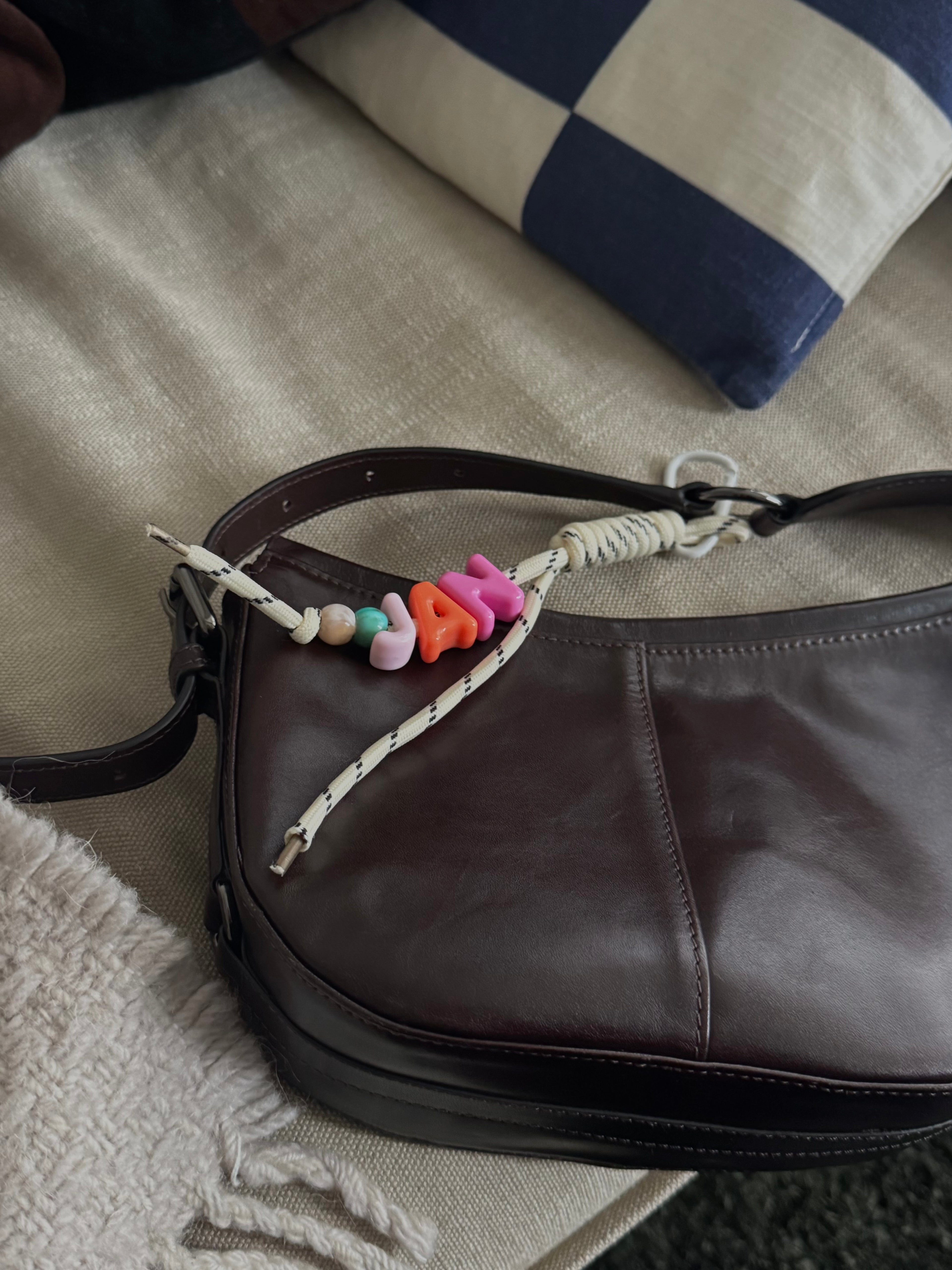 bag charm on handbag